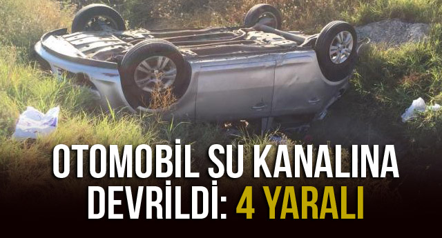 OTOMOBİL SU KANALINA DEVRİLDİ: 4 YARALI